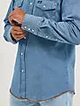 Wrangler Men's Authentic Cowboy Cut Work Shirt in stonewash denim, featuring button-front and long sleeves.