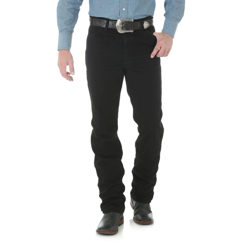 Wrangler Men's Cowboy Cut Slim Fit jeans in antique wash with shadow black color, shown on a model.