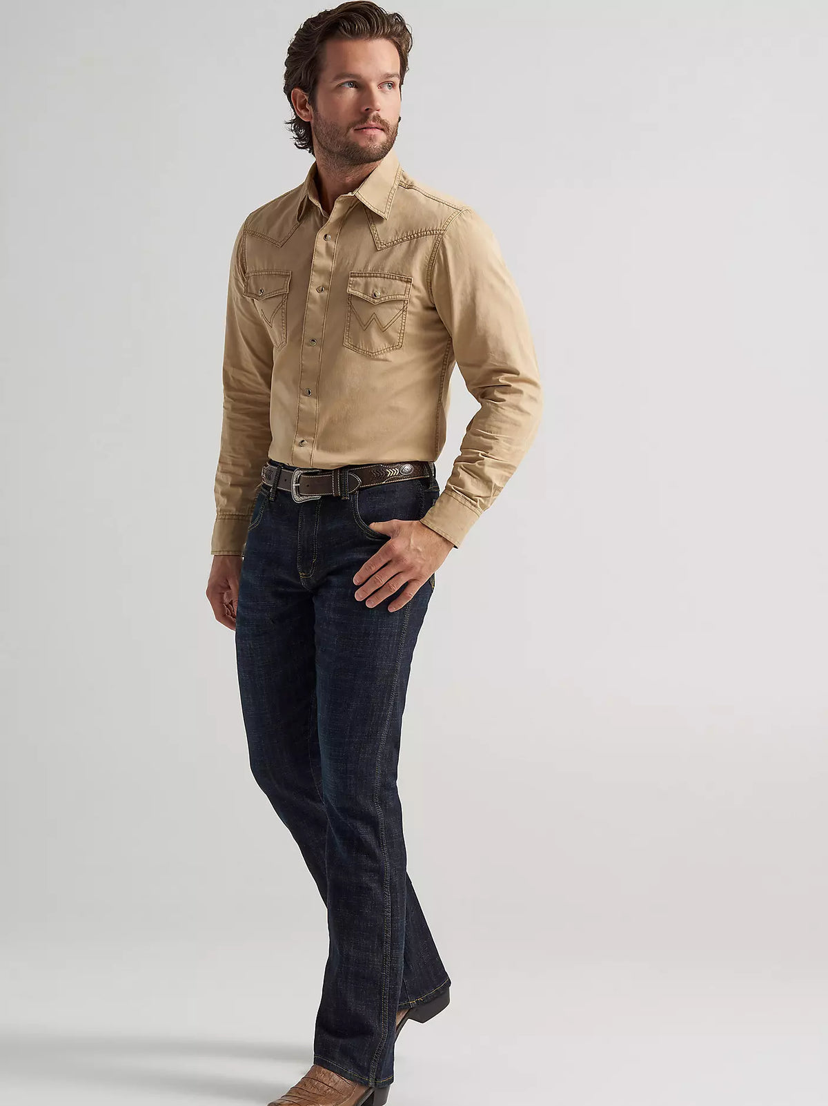 Wrangler Men's Retro Slim Boot Jean Dax in dark denim with classic five-pocket design and slim fit silhouette.