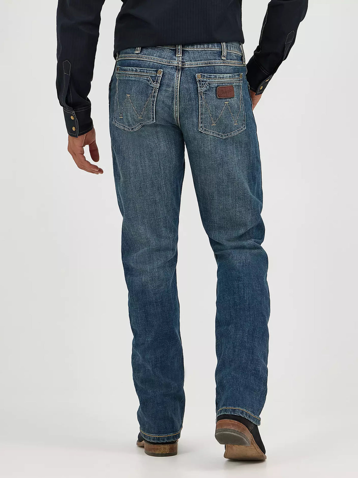 Wrangler Men's Retro Slim Boot Jean in Layton style, showcasing classic denim with a slim fit and boot cut design.