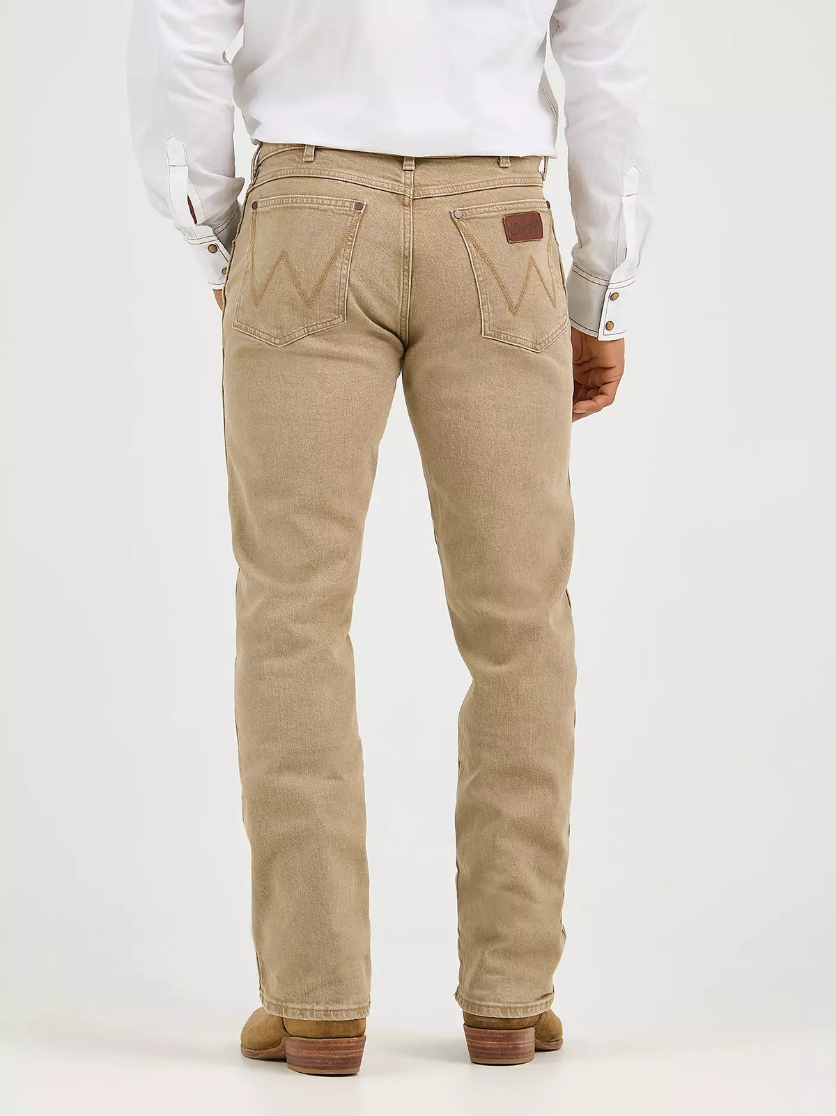 Wrangler Men's Retro Slim Straight Jean in saddle brown denim with classic five-pocket design and straight leg fit.