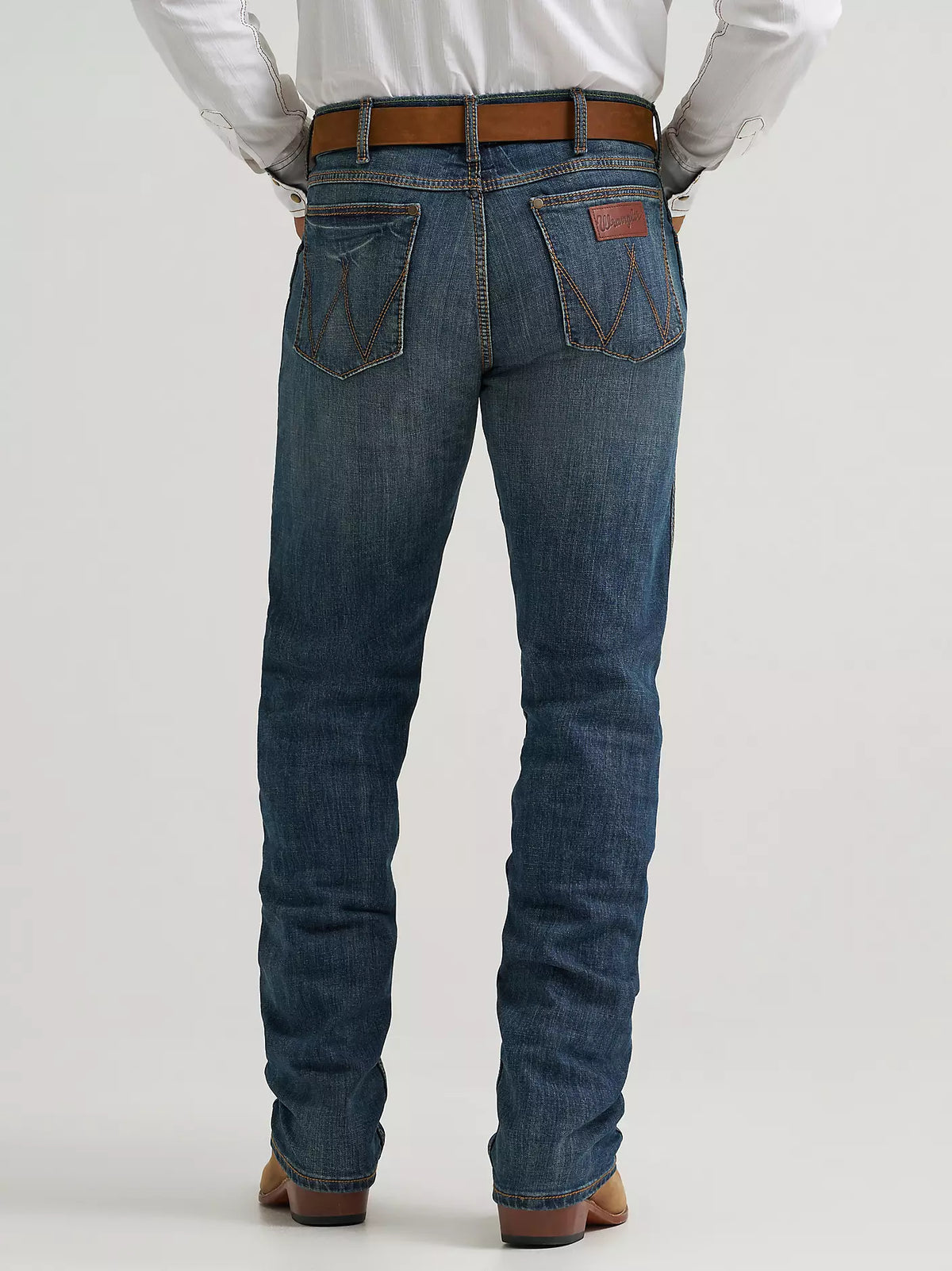 Wrangler Men's Retro Slim Straight Jean in Bozeman style, classic denim with a slim straight fit, shown in dark wash.