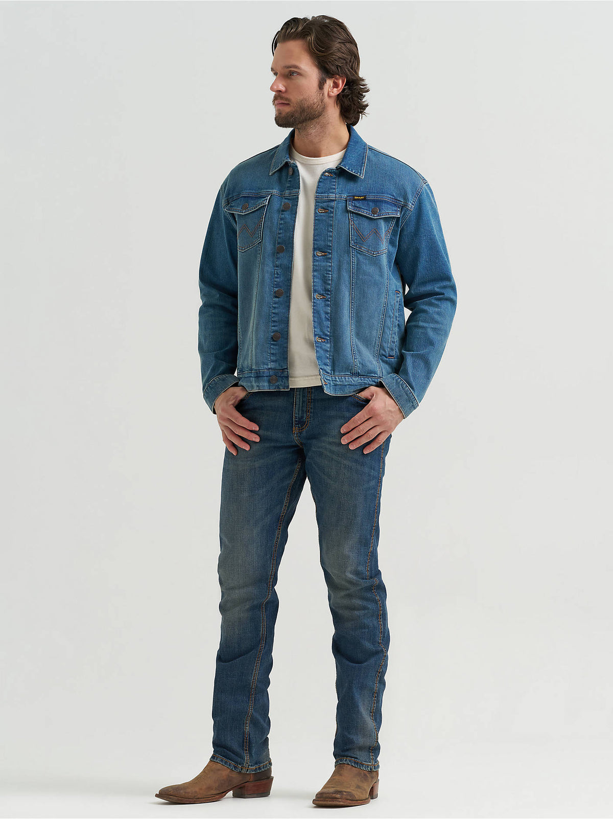 Front view of the Wrangler Retro® Unlined Denim Jacket in Slate Blue, showing spread collar and W-stitched pockets.