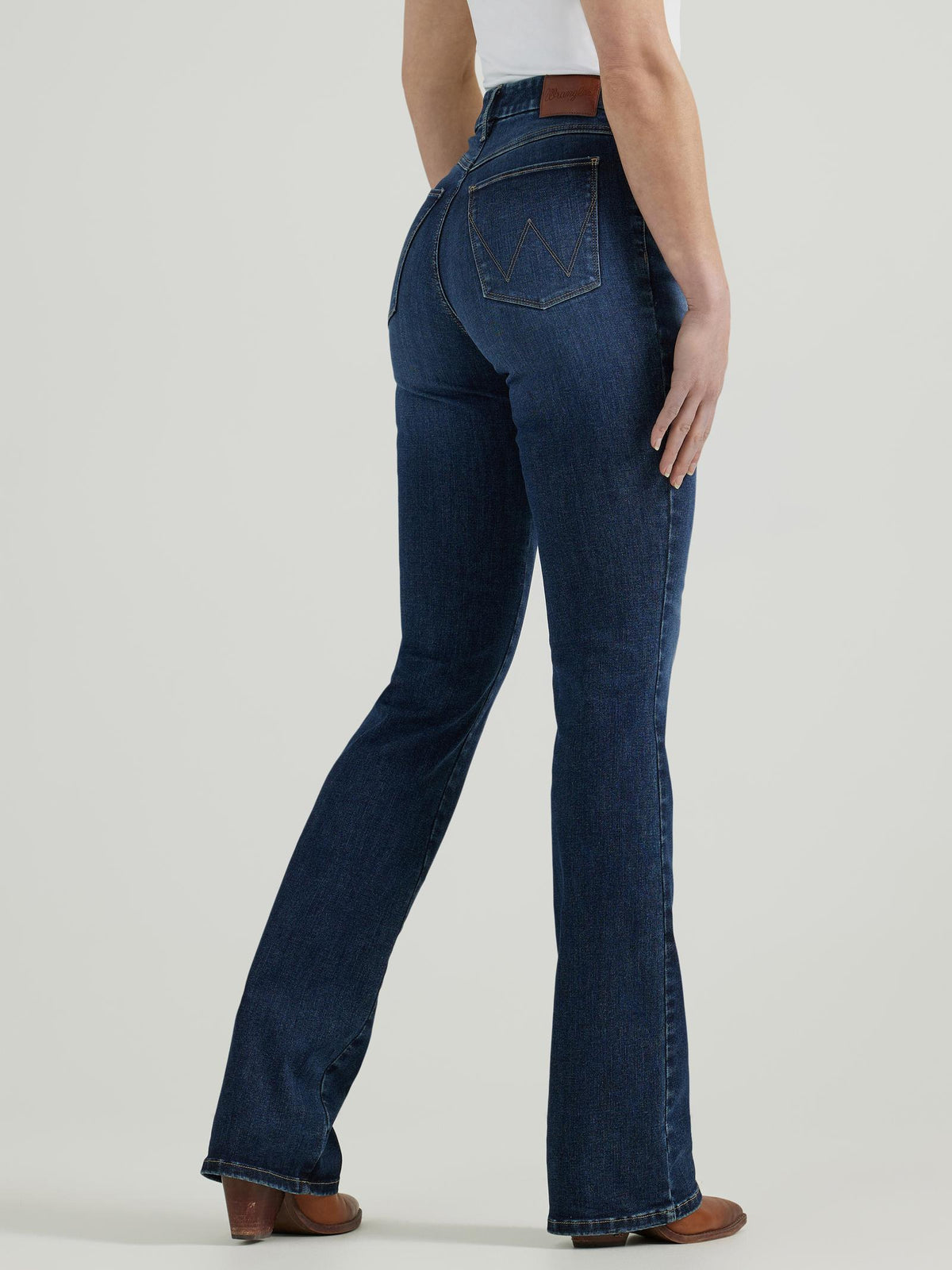 Wrangler Women's Bespoke Bootcut Jean in high-rise Lacey style, showcasing classic denim with a flattering fit and bootcut design.