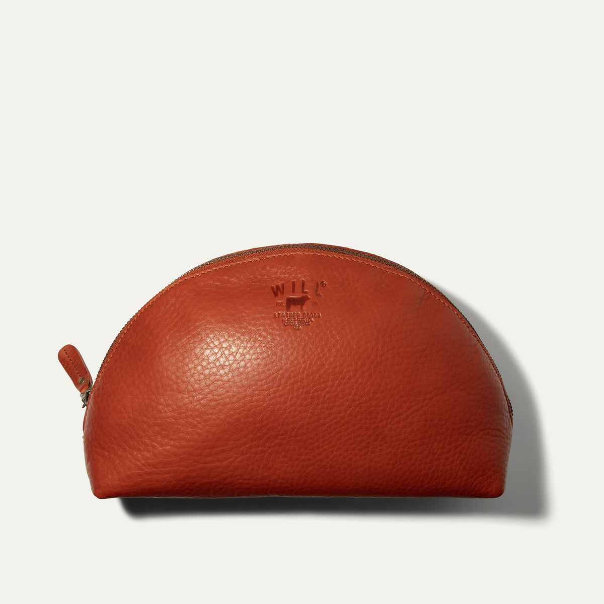 Large zip cosmetic bag by Will Leather Goods with a sleek leather exterior and spacious interior for travel essentials.